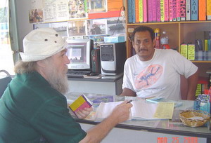 talking to the tour shop operator at Kuala Besut