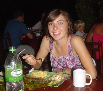 Kelsey enjoying her fish dinner ....